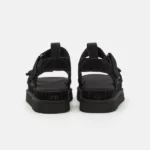 מגפי האג | UGG Goldenstar Black The Hague Sandals | Flip Flop